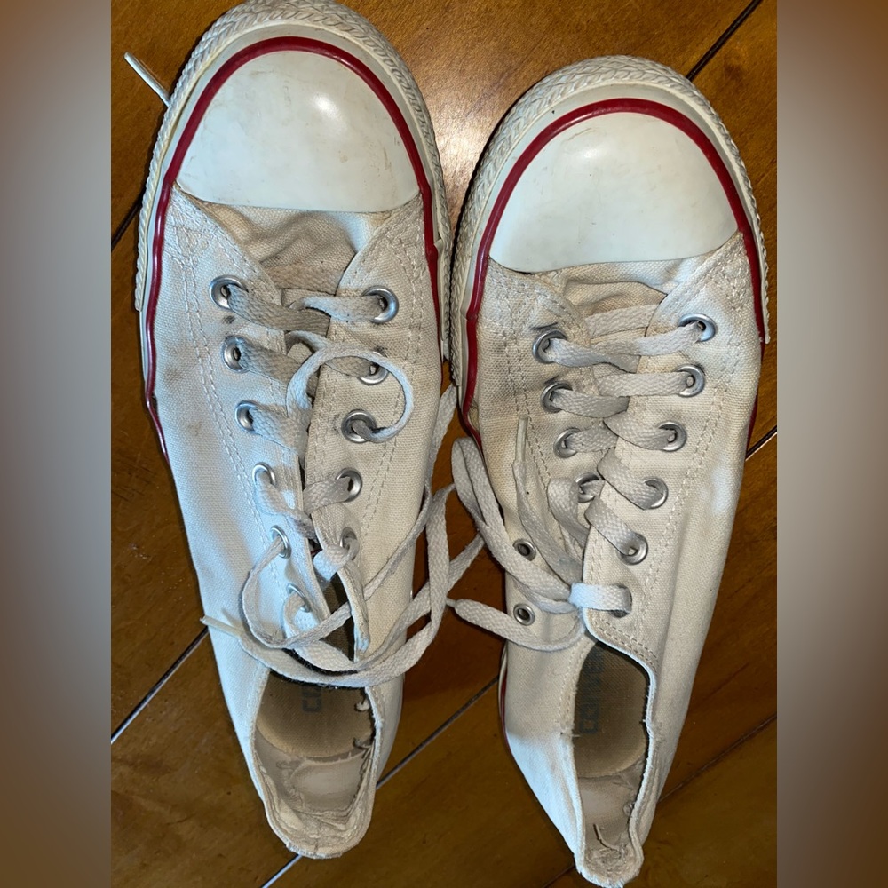 White worn chucks.